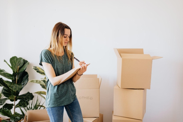A woman working with  commercial movers and storage in St Augustine